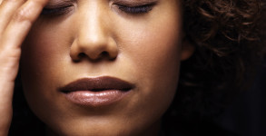 Young Woman Thinking --- Image by © Royalty-Free/Corbis