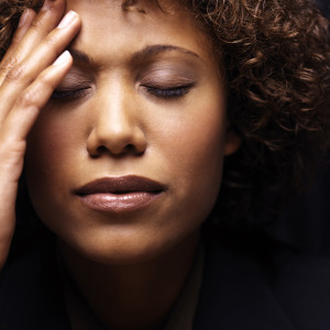 Young Woman Thinking --- Image by © Royalty-Free/Corbis